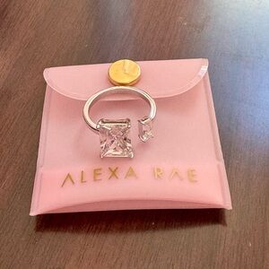 BRAND NEW NEVER WORN ALEXA RAE SILVER TONED ADJUSTABLE RING